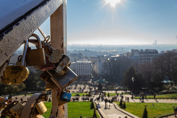  Padlocks hanging on railing at the Sacré-Coeur viewpoint