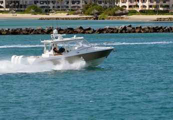 Wall Mural - High-End motorboat powered with three outboard engines .