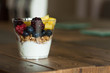 Yogurt parfait with fruits on table
