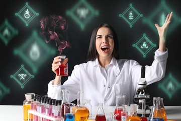 Wall Mural - Crazy female alchemist making elixir in laboratory