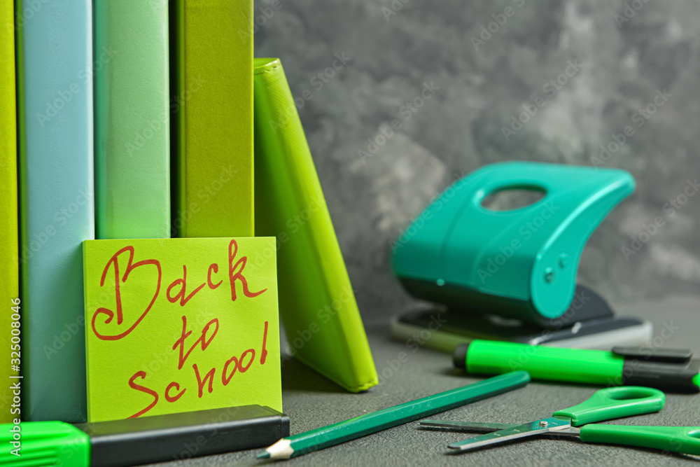 Set of school supplies on table