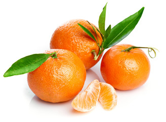 Wall Mural - Ripe tangerines with green leaf for design packing. Fruity still life citrus. Isolated on white background.