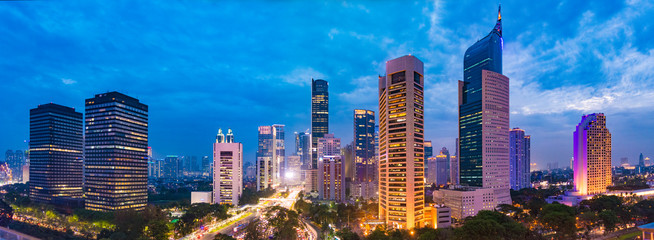 aerial view of jakarta's central business district at dusk (blue hour). jakarta cityscape at sunset.