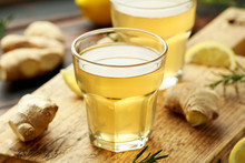 Kombucha Ginger, Lemon Tea In Glass ,on Wooden Board. Healthy Drink