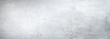 © Günter Albers - Texture of a smooth white concrete wall with cracks as a background or wallpaper