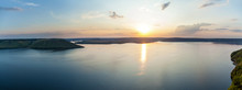 A Panoramic View Of A Sunset Above The Bay