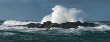 Massive Waves Crash Over The Rocks At Ballintoy Harbour, Causeway Coast, Northern Ireland