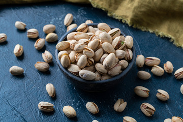 Roasted And Salted Pistachios In Ceramic Bowl