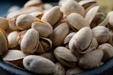 Wall Mural - Roasted And Salted Pistachios In Ceramic Bowl