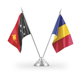 Romania and Papua New Guinea table flags isolated on white 3D rendering