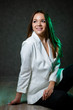 © DSMT - beautiful tanned girl in a white suit posing beautifully