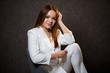 © DSMT - beautiful tanned girl in a white suit posing beautifully
