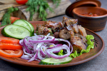 Wall Mural - pork skewers with a side dish of vegetables