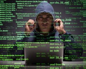young hacker in data security concept