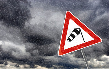 bad weather warning sign- caution - risk of storm and heavy rain,