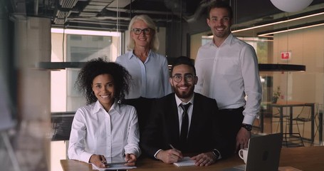 Poster - Happy different generations business people looking at camera.