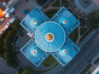  Close up aerial view on Trinity Cathedral in Saint Petersburg. Blue dome with golden cross and stars. Evening light. View from the top. St Petersburg is most famous city in Russia. Orthodox church.