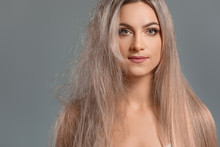 Beautiful Young Woman Before And After Hair Treatment On Grey Background