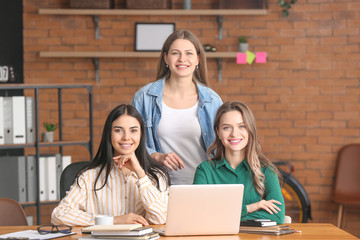 Sticker - Beautiful young businesswomen working together in office