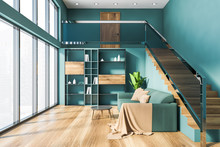 Blue Living Room With Sofa, Stairs And Cupboard