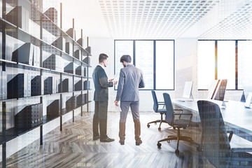 Canvas Print - Two managers in white office with bookcase