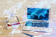 © peshkova - Double exposure of desktop computer and technology theme hologram. Concept of software development.