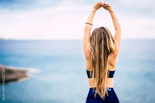 Healthy lifestyle people concept with beautiful long blonde hair girl viewed fro Poster Mural XXL