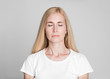 © Prostock-studio - Beautiful middle-aged woman posing with closed eyes