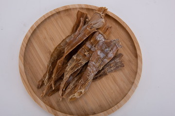 The dried bamboo shoots made of delicious bamboo shoots are on the white background