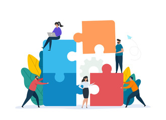 teamwork concept with building puzzle. people working together with giant puzzle elements. symbol of