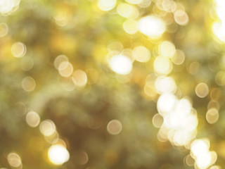 Wall Mural - Yellow light bokeh nature background. Natural bokeh. Abstract blurred background. 