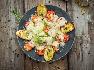 Wall Mural - Healthy Grilled Chicken Caesar Salad with Cheese