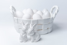White Porcelain Easter Bunny And Egg Corp With White Eggs On White Background