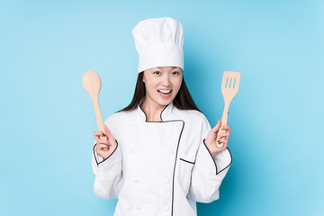 Young japanese chef woman cooking