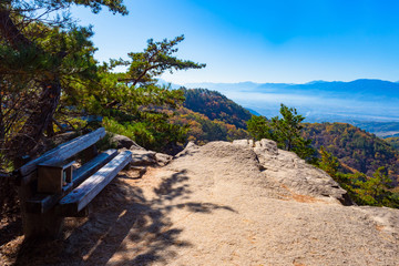 Wall Mural - Japan. Kofu. Bench on top of the mountain. Natural landscape of Japan. The journey to the canyon Kofu. A place to rest on the top of the mountain. Guide to Japan. East Asia.