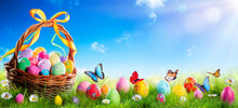 Easter - Painted Eggs In Basket On Grass With Sunny Spring Background