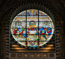 Stained Glass Window With "The Last Supper" By Pastorino Dei Pastorini. Duomo Of Siena, Tuscany, Italy.