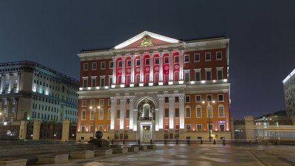 Wall Mural - Historical building of Moscow City Hall at Tverskay street at evening lightning with light trains timelapse , Moscow, Russia