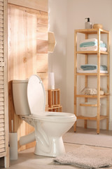 Sticker - Modern toilet bowl in stylish bathroom interior