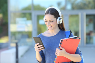 Sticker - Student using smart phone and listening music at university