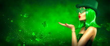 St. Patrick's Day Leprechaun Model Girl Pointing Hand, Holding Product On Green Magic Background, Blowing Flying Shamrock Leaves. Patrick Day Pub Party, Celebrating. Border Art Design, Widescreen