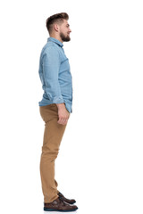 Poster - Side view of a confident casual man looking forward