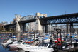 Burrard Bridge in Vancouver, British Columbia, Canada. It spans False Creek and connects Vancouver's Kitsilano and West-End neighbourhoods.