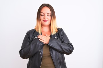 Sticker - Young beautiful woman wearing t-shirt and jacket standing over isolated white background smiling with hands on chest with closed eyes and grateful gesture on face. Health concept.