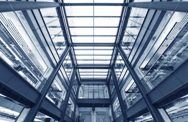 Poster - Interior view of modern shopping mall. Building abstract background