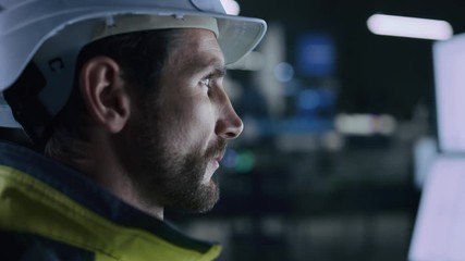 Aufkleber - Industry 4.0 Modern Factory: Portrait of Facility Operator Controls Workshop Production Line, Uses Computer with Screens Showing Complex UI of Machine Operation Processes, Controllers