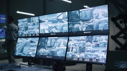 Leinwandbilder - Industry 4.0 Modern Factory: Security Control Room with Multipoke Computer Screens Showing Surveillance Camera Footage Feed. High-Tech Security