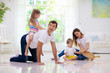© famveldman - Happy family with kids at home