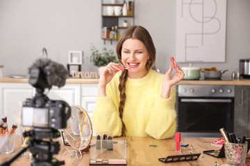 Sticker - Young beauty blogger recording video at home