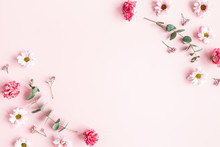 Flowers Composition. Pink Flowers And Eucalyptus Branches On Pink Background. Valentines Day, Mothers Day, Womens Day Concept. Flat Lay, Top View
